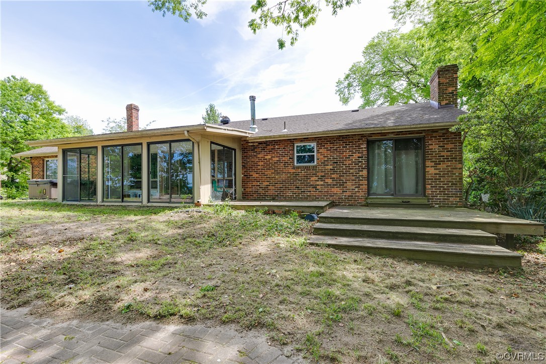 900 Jordan Point Road Hopewell, VA 23860 - Photo 31 of 41 a front view of a house with a garden