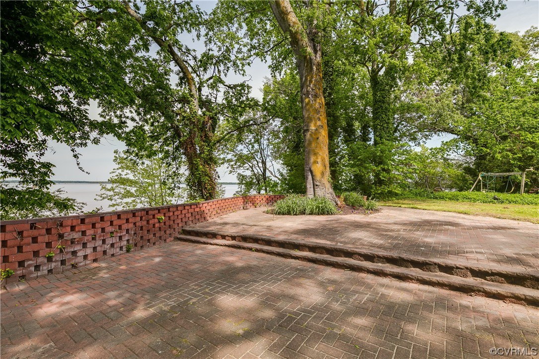 900 Jordan Point Road Hopewell, VA 23860 - Photo 32 of 41 a view of a yard with plants and trees
