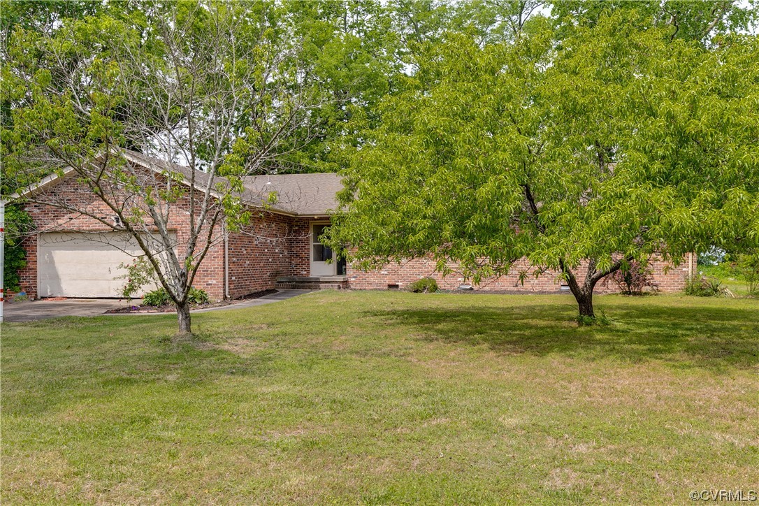 900 Jordan Point Road Hopewell, VA 23860 - Photo 10 of 41 a view of a field with a tree