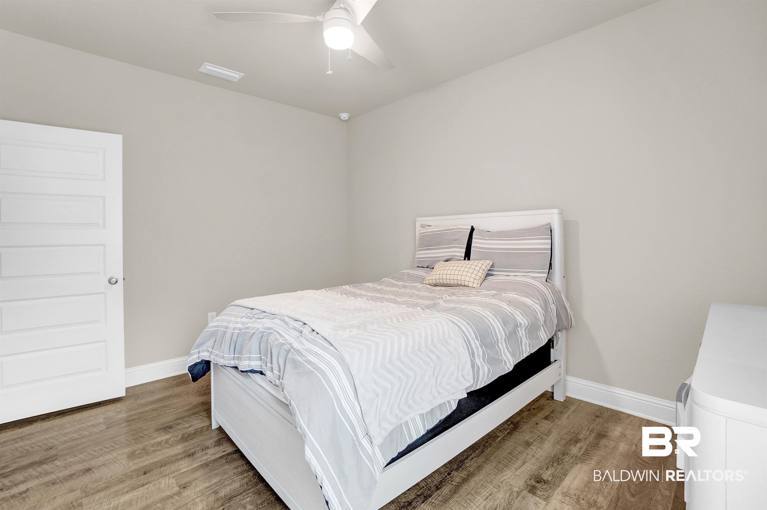 31671 Memphis Loop Daphne, AL 36527 - Photo 8 of 51 Bedroom with baseboards, wood finished floors, and a ceiling fan