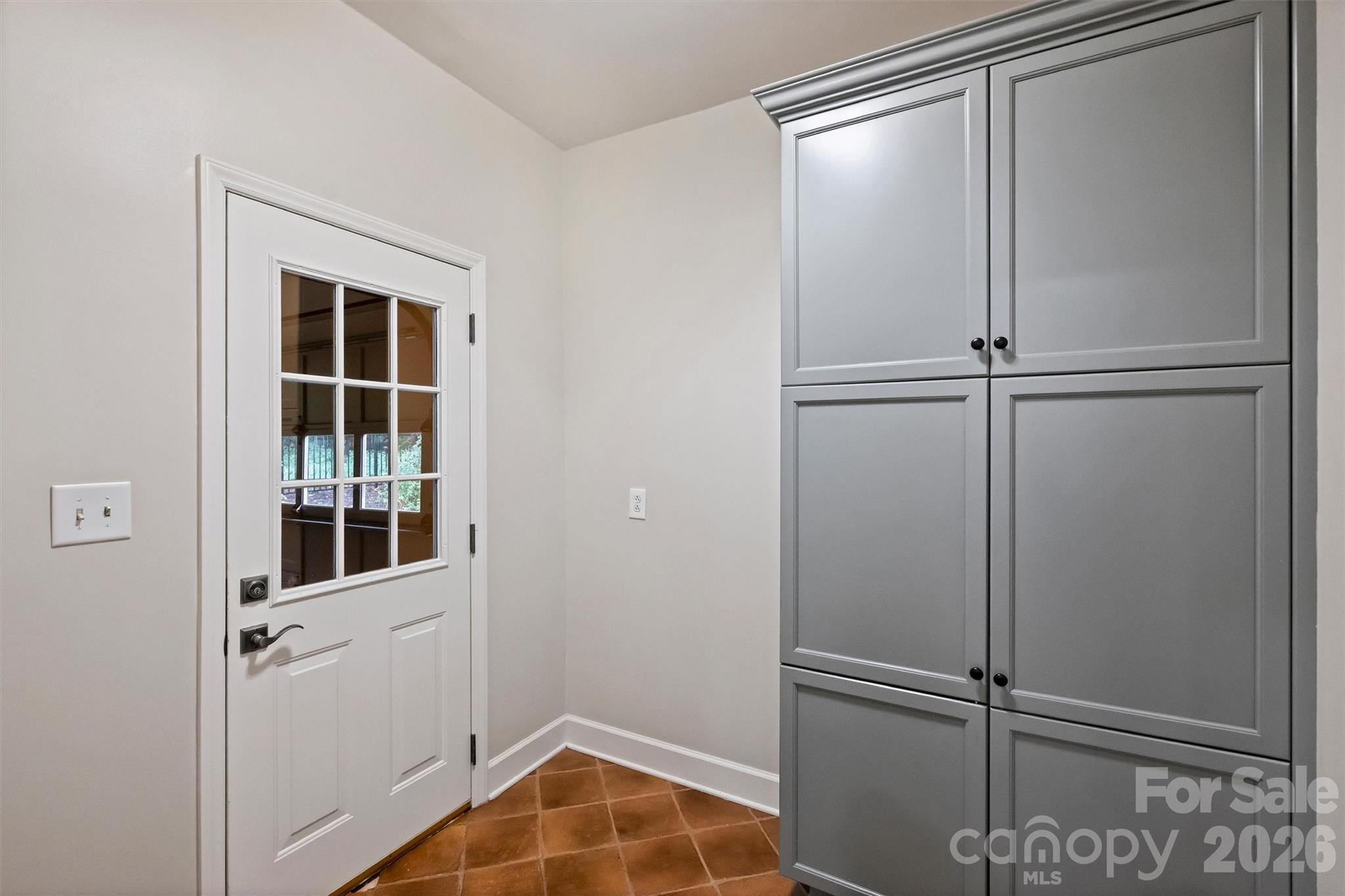 5519 Robinhood Road Charlotte, NC 28211 - Photo 40 of 46 a view of a room with rack on the wall