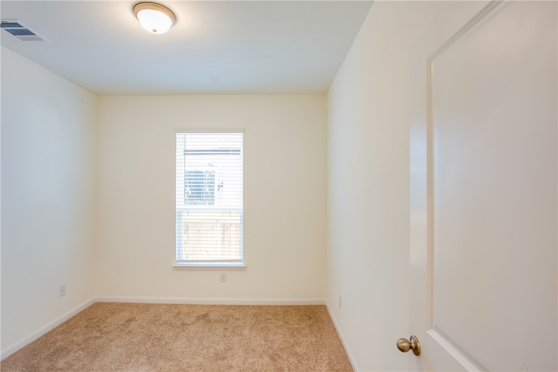 112 Rebel Red Road Liberty Hill, TX 78642 - Photo 15 of 29 a small space with a window