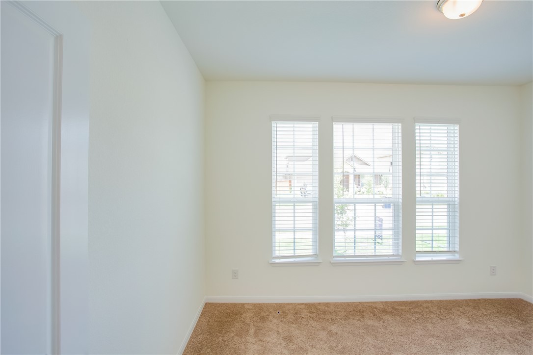 112 Rebel Red Road Liberty Hill, TX 78642 - Photo 19 of 29 an empty room with a window