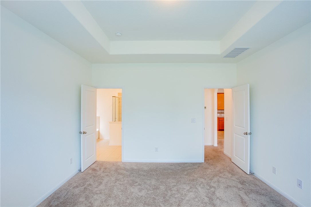 112 Rebel Red Road Liberty Hill, TX 78642 - Photo 20 of 29 an empty room with an entryway door