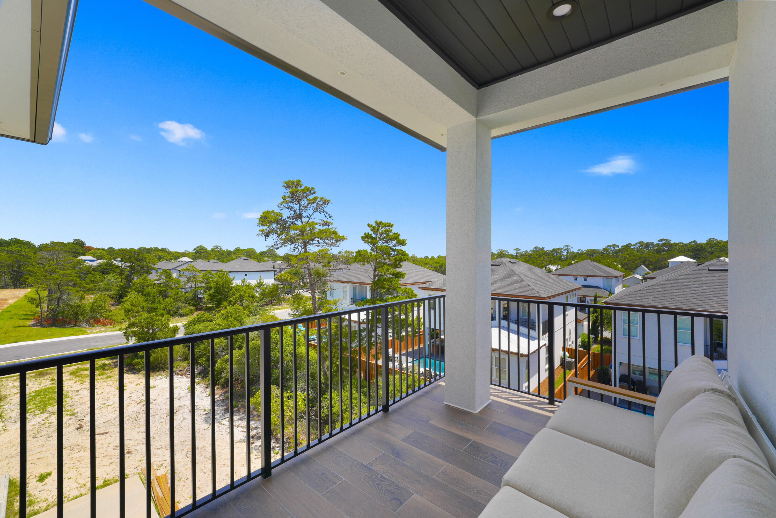56 Sea Croft Cove Santa Rosa Beach, FL 32459 - Photo 54 of 65 a view of a balcony with furniture