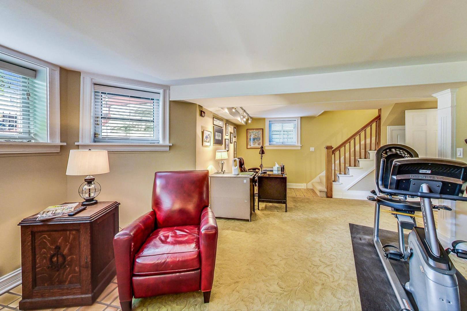 1934 West Grace Street Chicago, IL 60613 - Photo 16 of 34 a living room with furniture and wooden floor