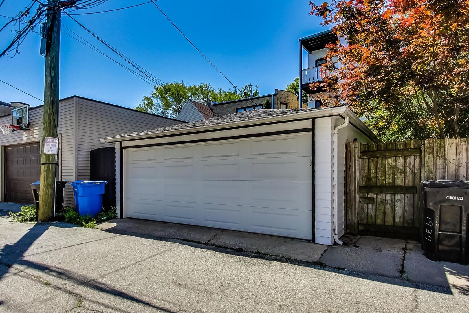1934 West Grace Street Chicago, IL 60613 - Photo 30 of 34 a front view of a house with garage