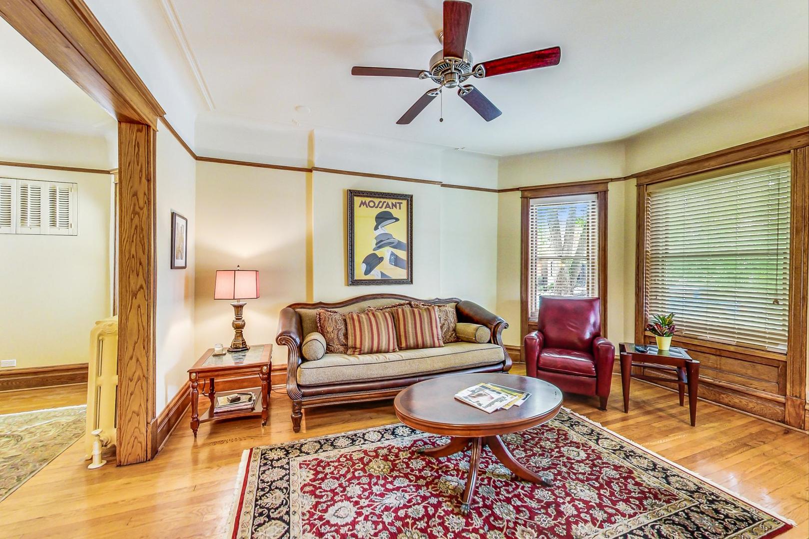 1934 West Grace Street Chicago, IL 60613 - Photo 6 of 34 a living room with furniture and a rug