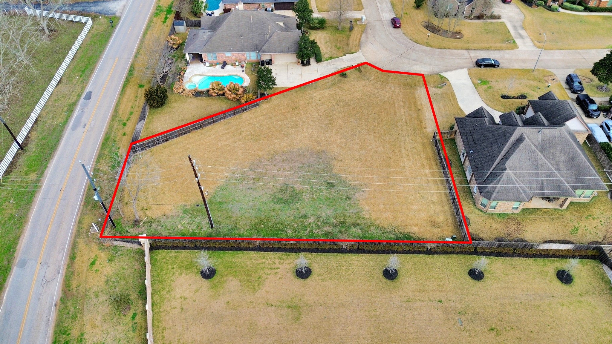 33231 Worthing Lane Fulshear, TX 77441 - Photo 1 of 28 an aerial view of a swimming pool