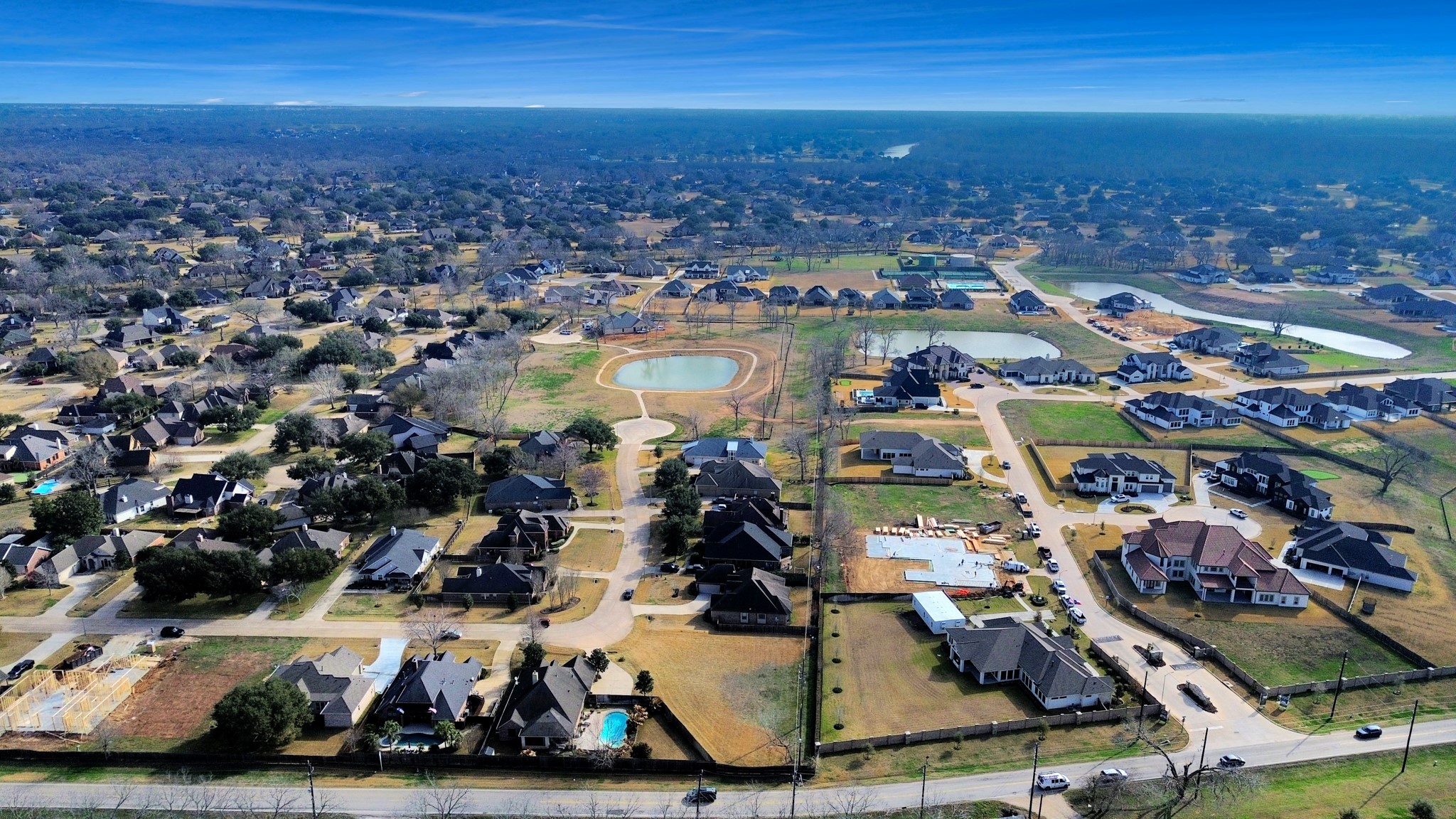 33231 Worthing Lane Fulshear, TX 77441 - Photo 14 of 28 an aerial view of residential houses with outdoor space