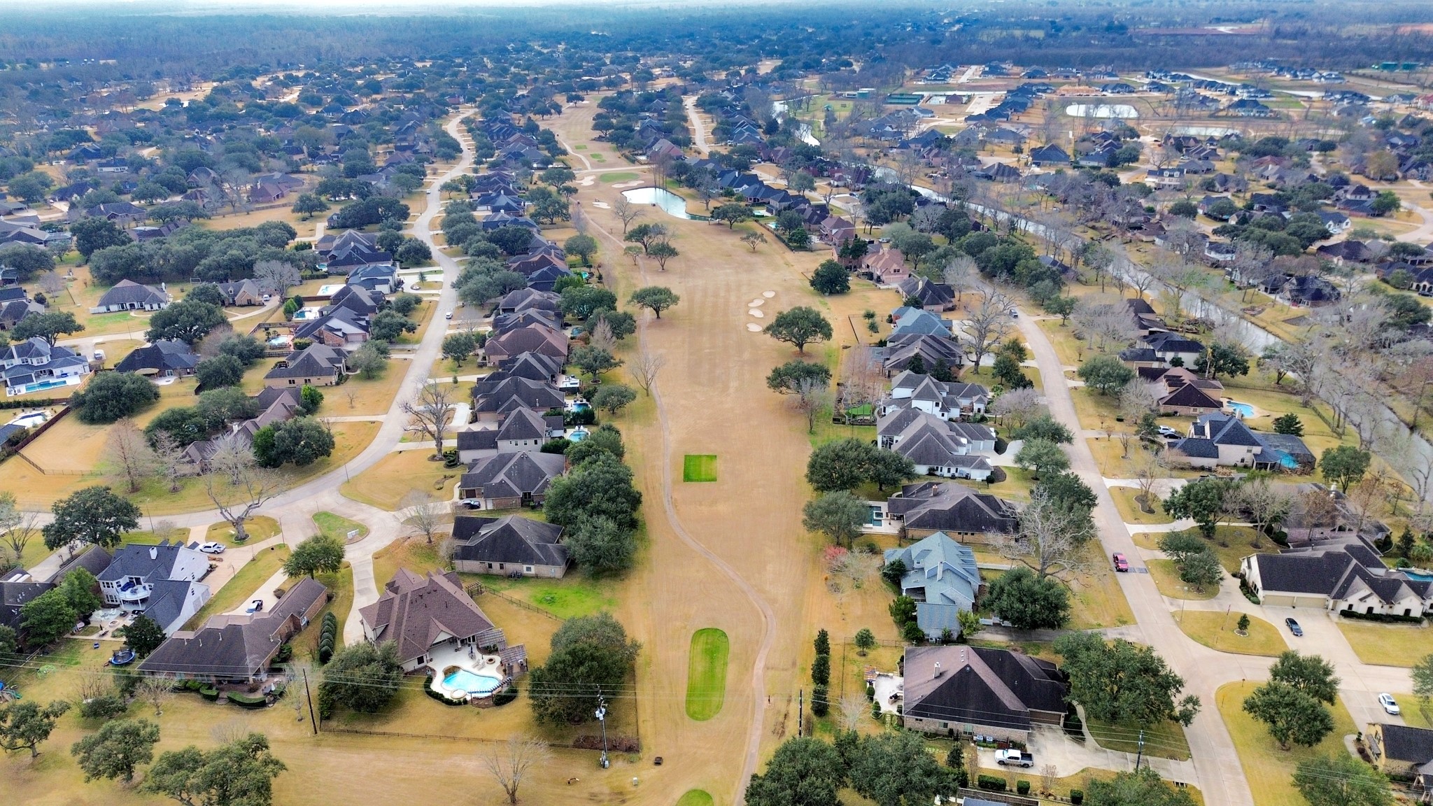 33231 Worthing Lane Fulshear, TX 77441 - Photo 19 of 28 an aerial view of residential building and parking space