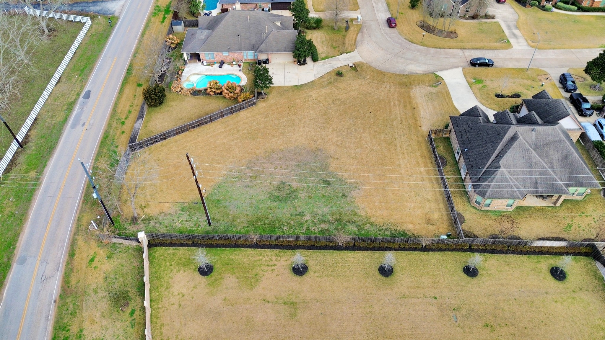 33231 Worthing Lane Fulshear, TX 77441 - Photo 9 of 28 an aerial view of a swimming pool