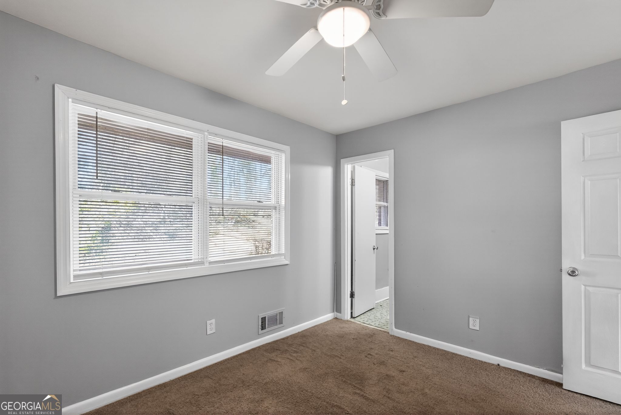 2522 Brentwood Court Decatur, GA 30032 - Photo 22 of 32 a view of an empty room with a window