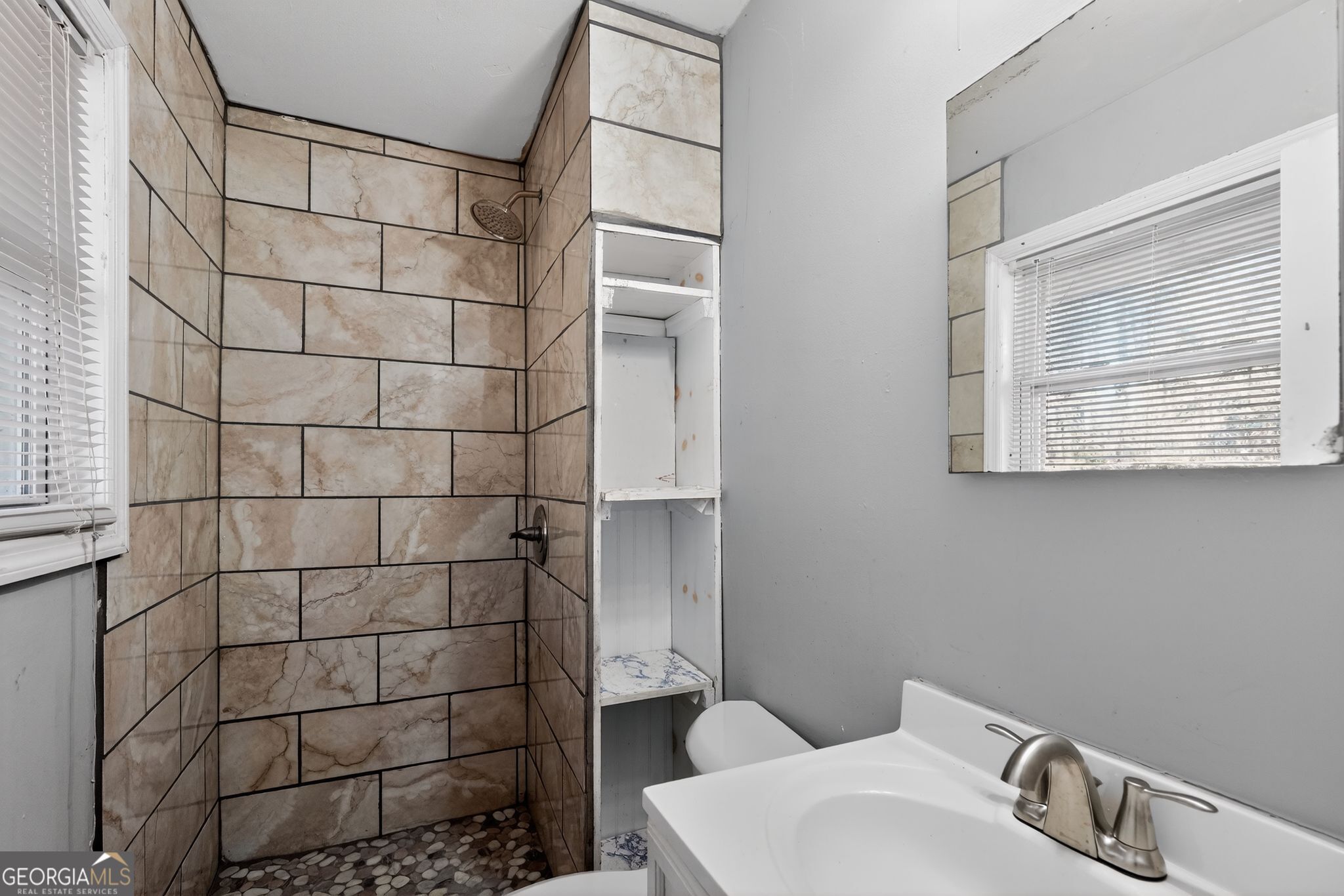 2522 Brentwood Court Decatur, GA 30032 - Photo 28 of 32 a bathroom with a toilet and a sink