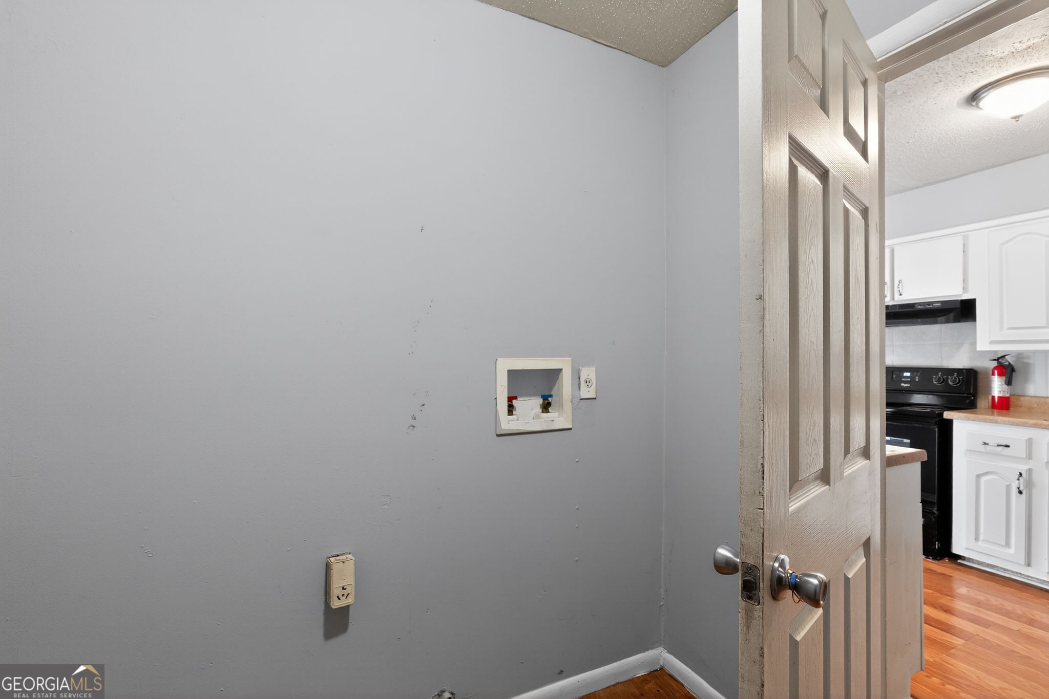 2522 Brentwood Court Decatur, GA 30032 - Photo 29 of 32 a view of a hallway with wooden floor