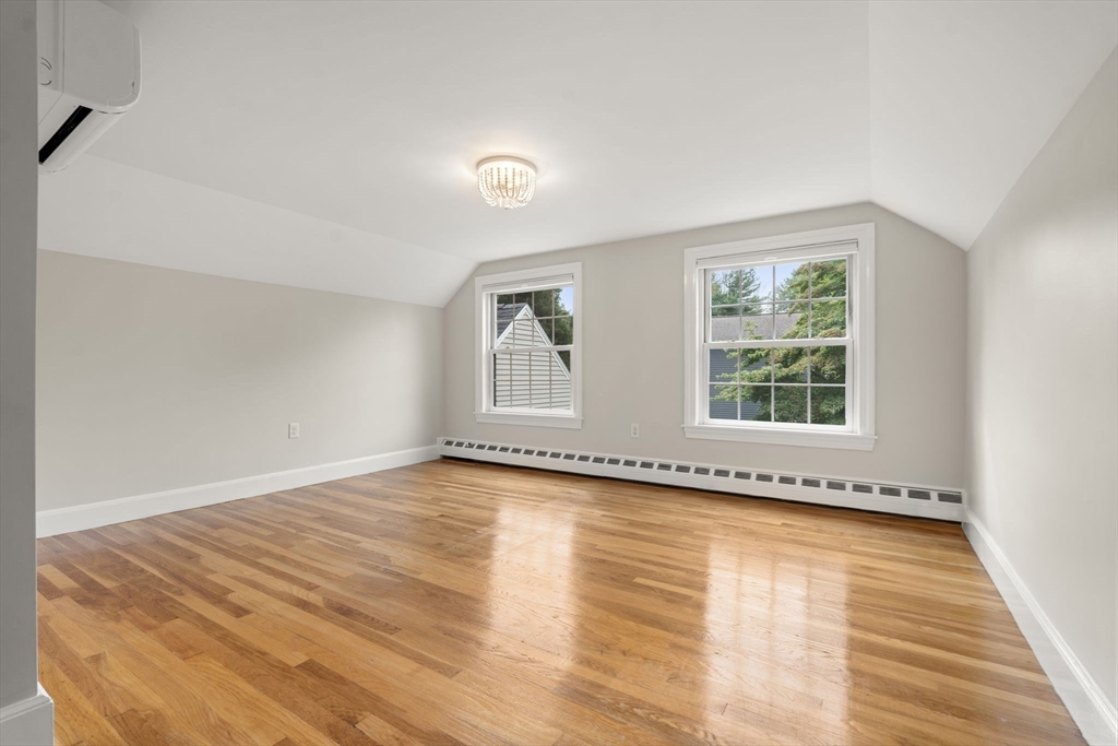 92 Abbot Street Andover, MA 01810 - Photo 28 of 35 wooden floor in an empty room with a window