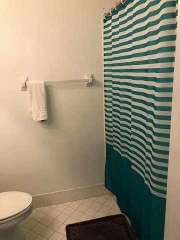 a bathroom with a sink and toilet