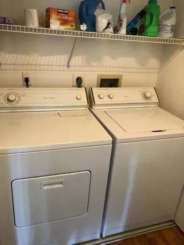 a close up view of washer and dryer with washer