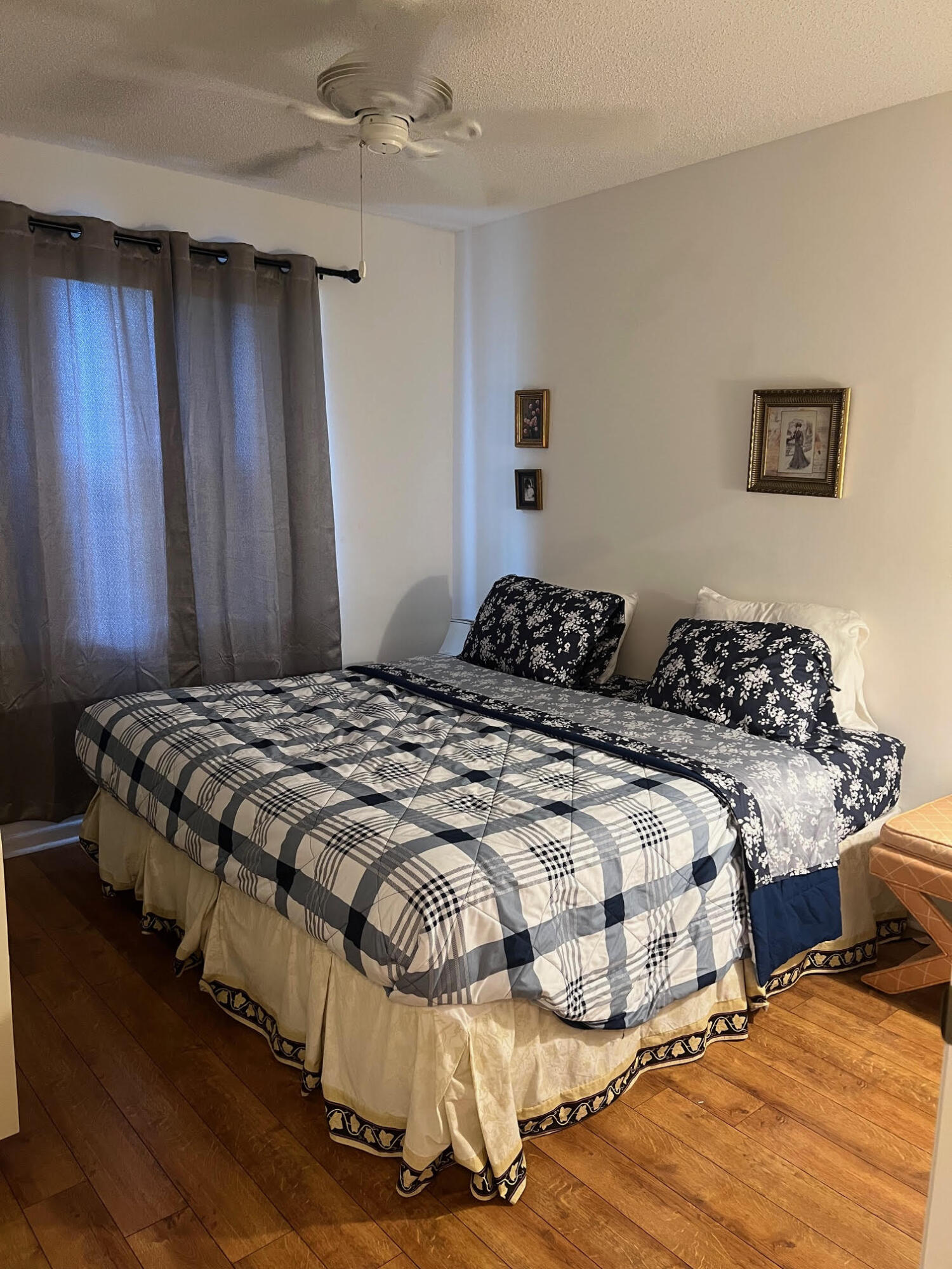 5265 Brisata Circle, Unit E Boynton Beach, FL 33437 - Photo 21 of 30 a bedroom with double bed and a window