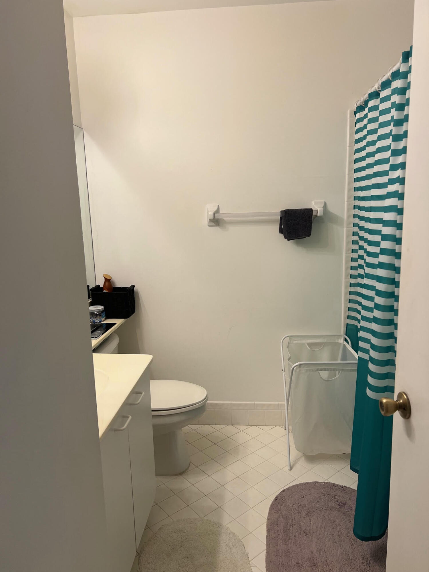5265 Brisata Circle, Unit E Boynton Beach, FL 33437 - Photo 23 of 30 a white toilet sitting next to a shower