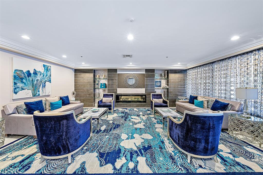 5265 Brisata Circle, Unit E Boynton Beach, FL 33437 - Photo 28 of 30 a living room with furniture a window and a table