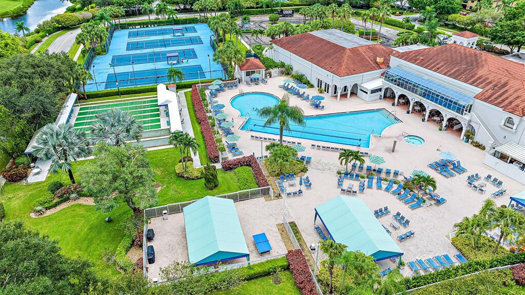 5265 Brisata Circle, Unit E Boynton Beach, FL 33437 - Photo 29 of 30 an aerial view of residential houses with outdoor space and parking