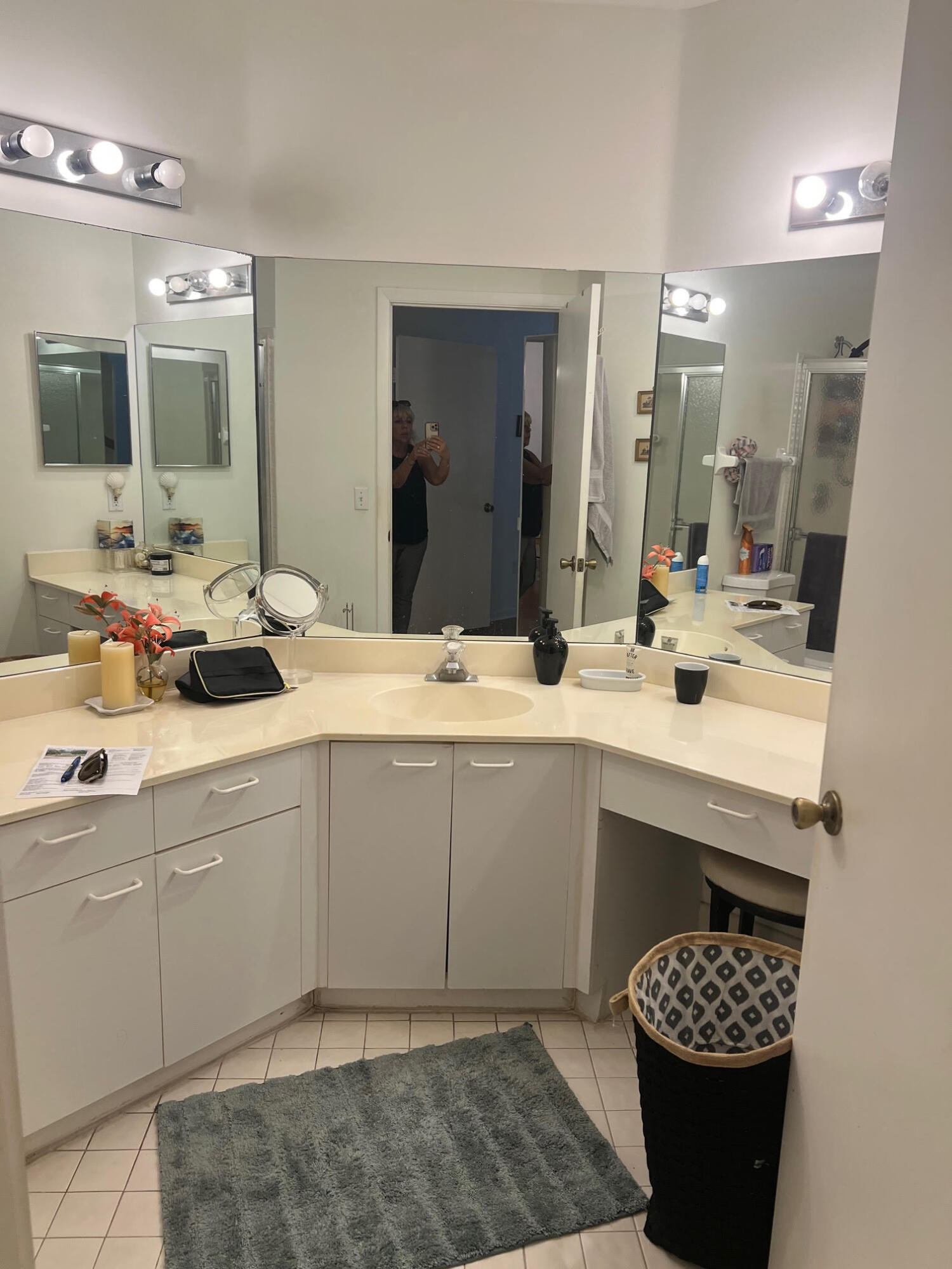 5265 Brisata Circle, Unit E Boynton Beach, FL 33437 - Photo 8 of 30 a bathroom with a sink and a mirror