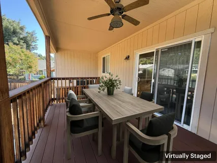 a view of a balcony with furniture