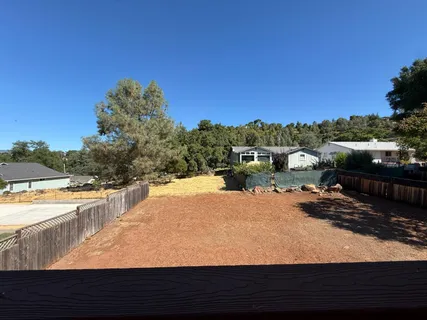 a view of swimming pool with lake view and mountain view
