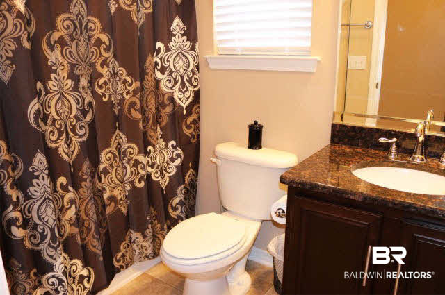 138 Meadow Run Loop West Foley, AL 36535 - Photo 14 of 24 Granite in the kitchen and baths