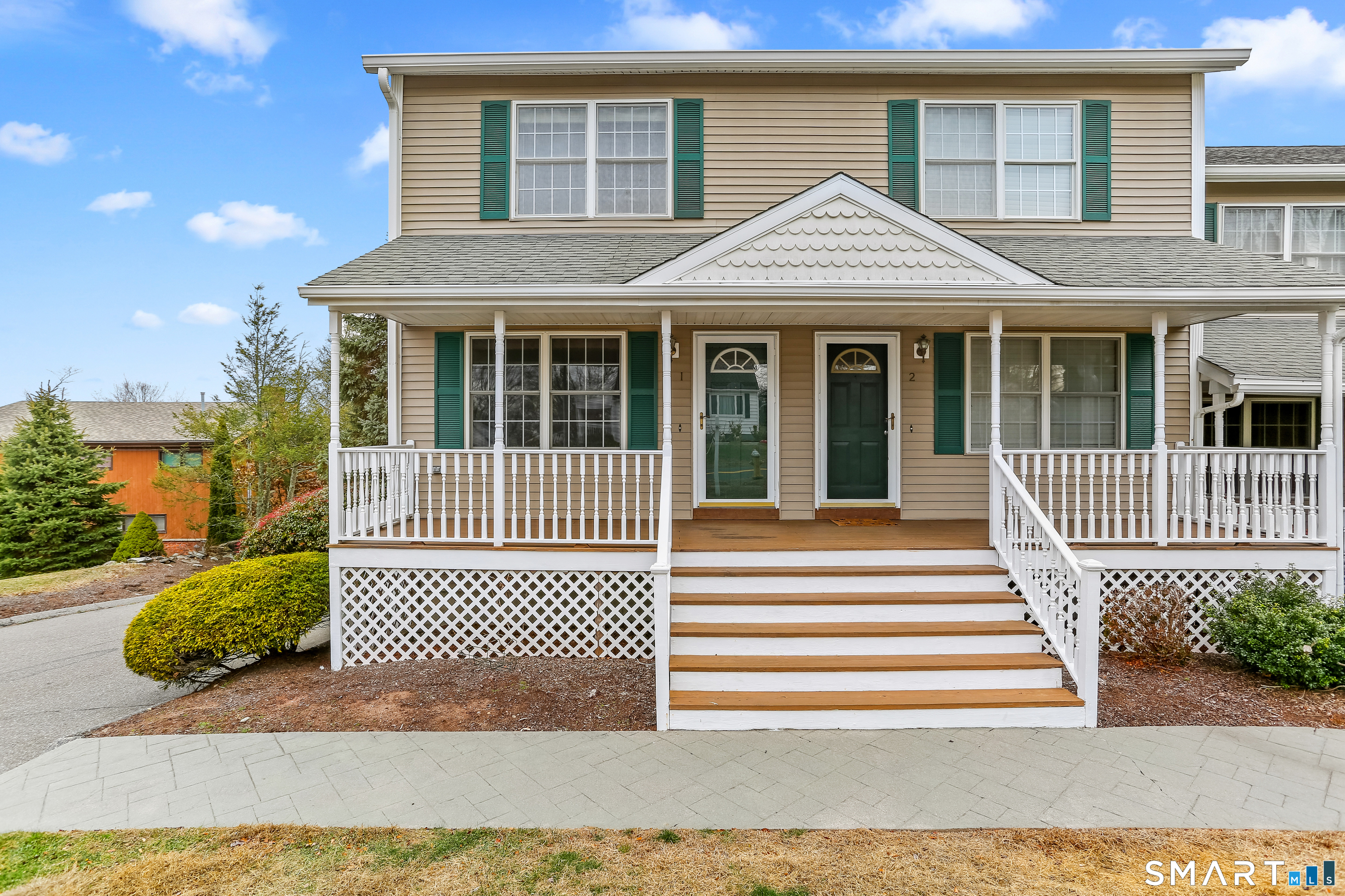 39 Coram Road, Unit 1 Shelton, CT 06484 - Photo 1 of 28 a front view of a house with a porch