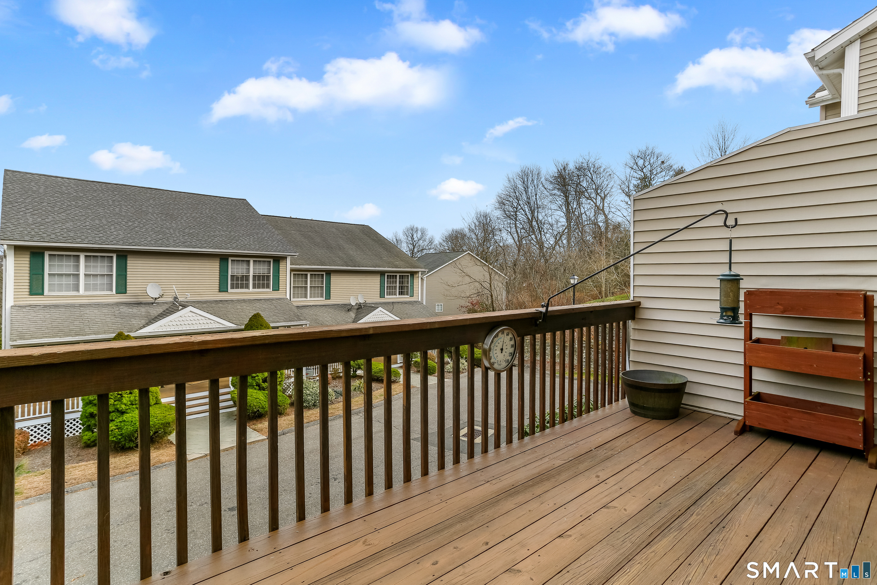 39 Coram Road, Unit 1 Shelton, CT 06484 - Photo 13 of 28 a balcony view with a seating space