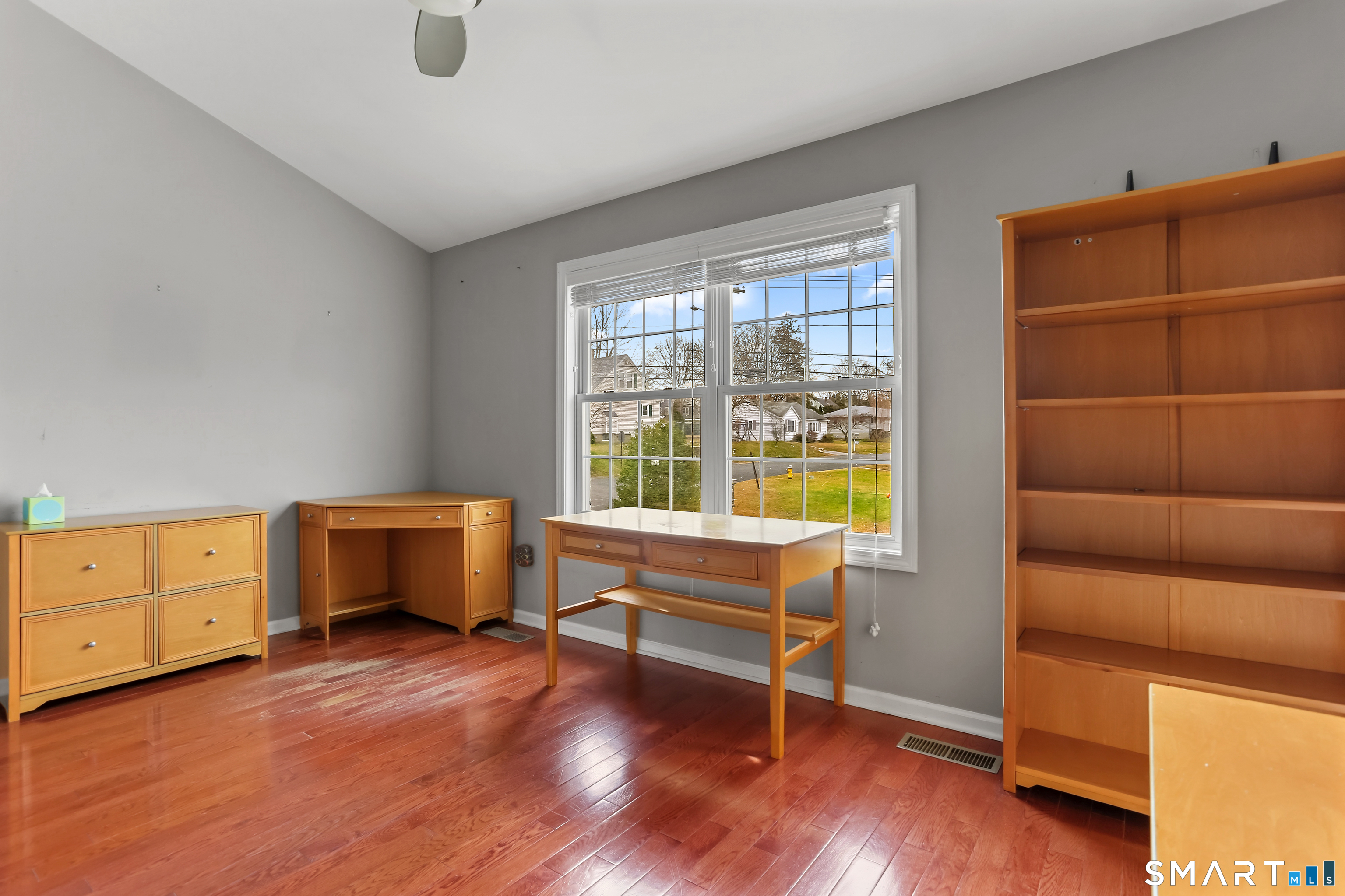 39 Coram Road, Unit 1 Shelton, CT 06484 - Photo 16 of 28 a bedroom with furniture and a window