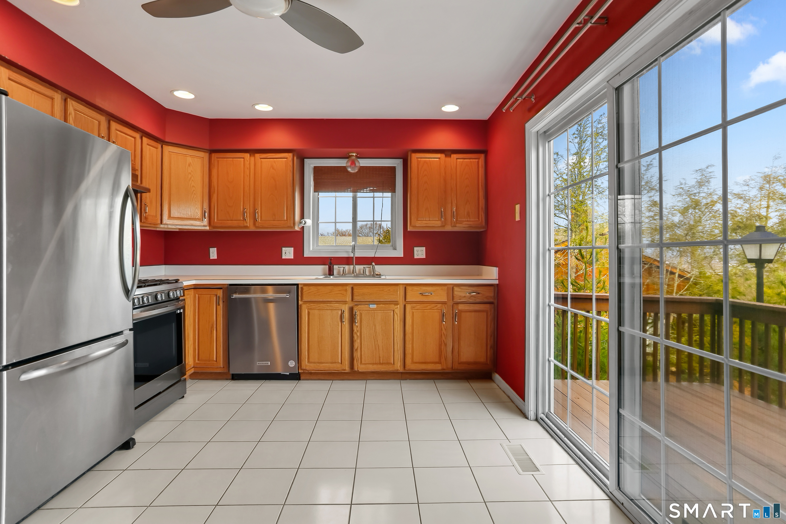 39 Coram Road, Unit 1 Shelton, CT 06484 - Photo 9 of 28 a kitchen with a sink stove and cabinets