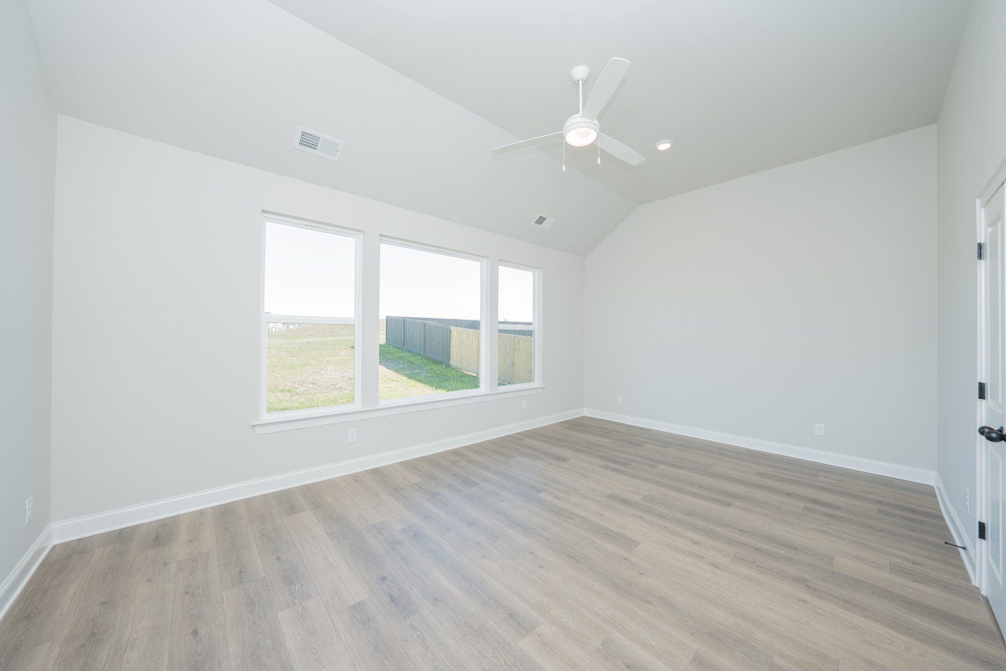 3033 Shandor St Spring Hill Spring Hill, TN 37174 - Photo 27 of 70 an empty room with wooden floor and windows