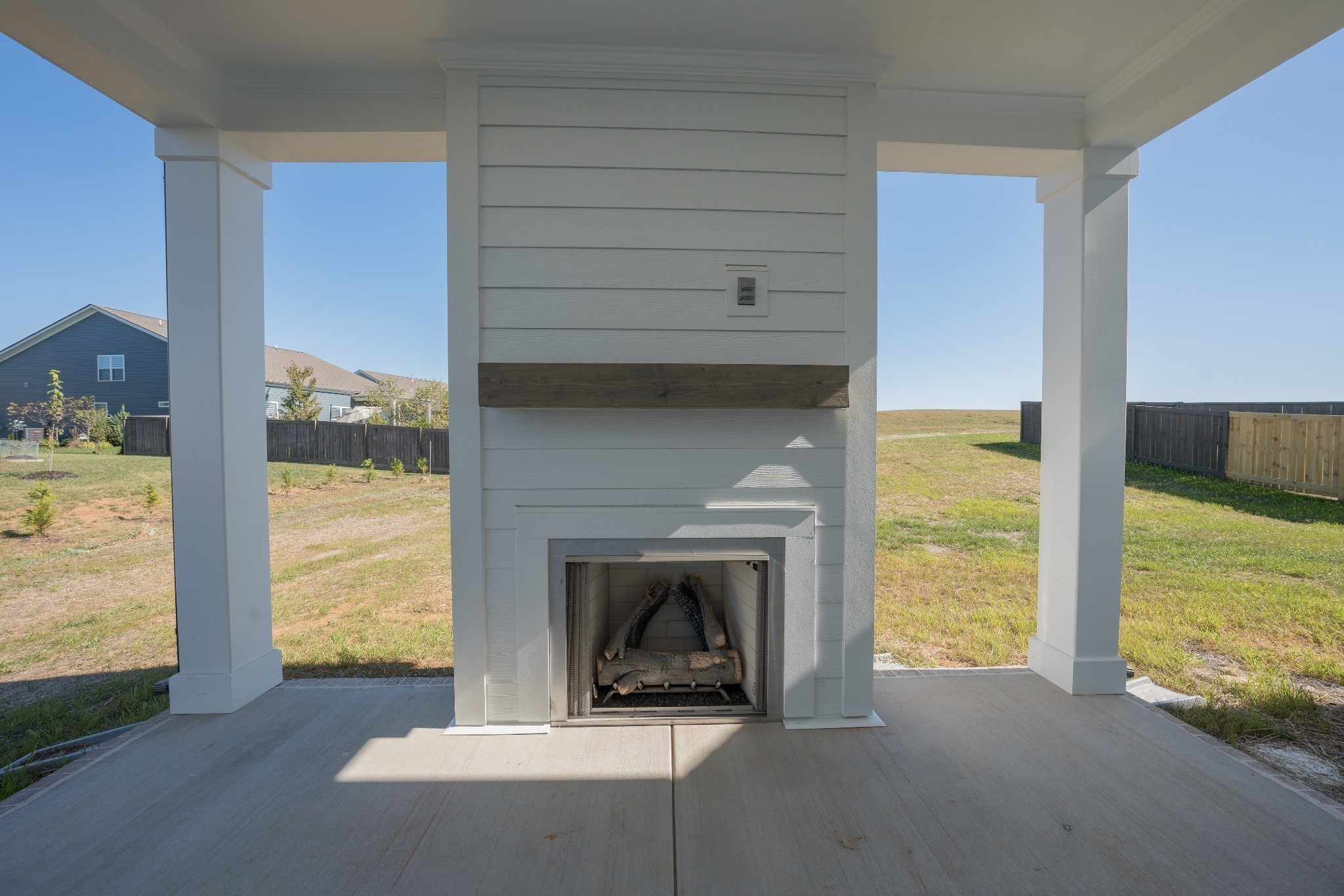 3033 Shandor St Spring Hill Spring Hill, TN 37174 - Photo 58 of 70 a living room with furniture and a fireplace