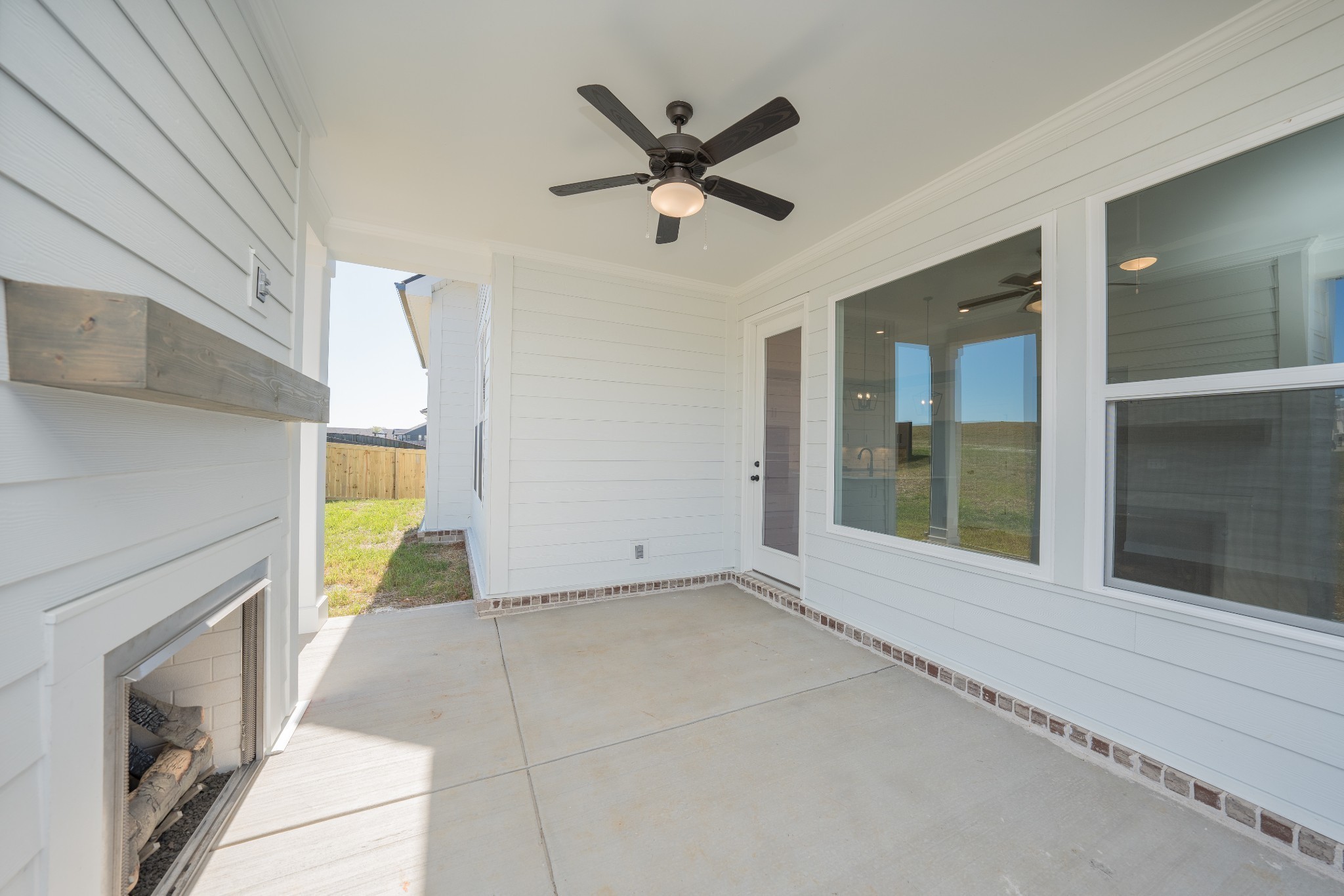 3033 Shandor St Spring Hill Spring Hill, TN 37174 - Photo 59 of 70 a view of an empty room with a ceiling fan and window