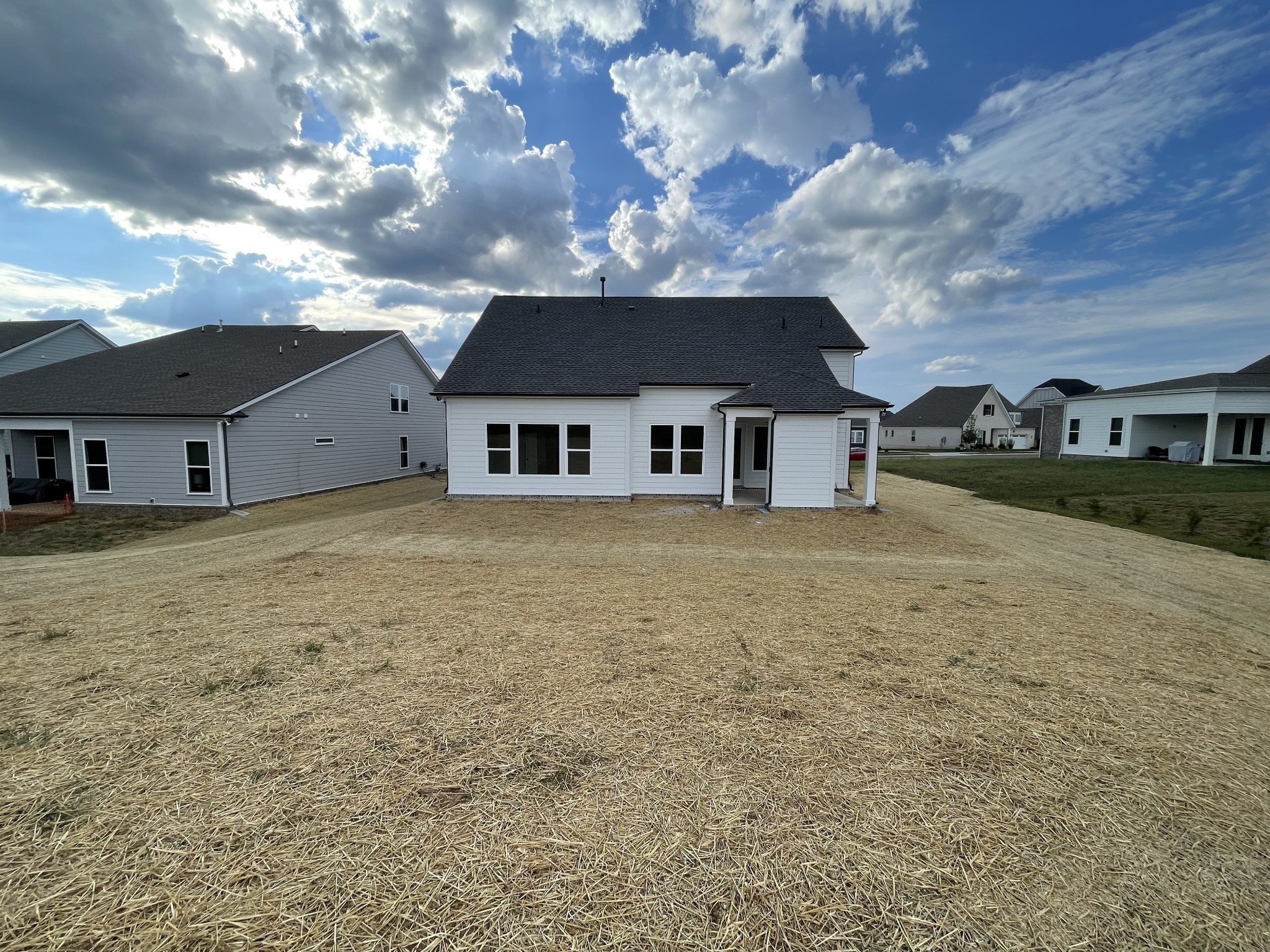 3033 Shandor St Spring Hill Spring Hill, TN 37174 - Photo 62 of 70 a view of a house with a yard