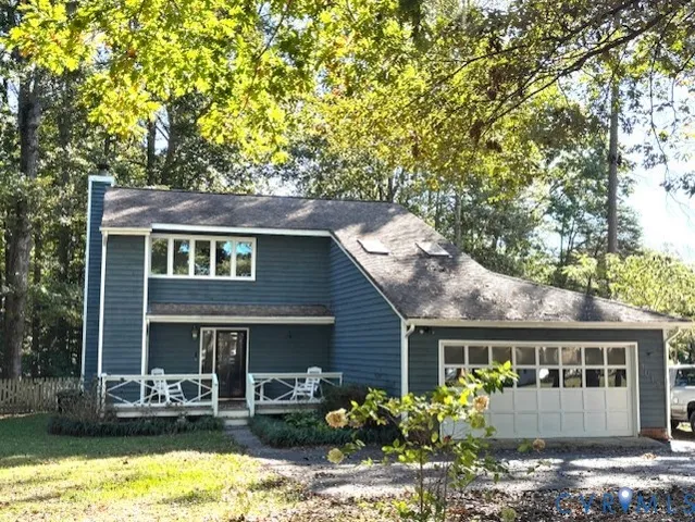 front view of house with a yard