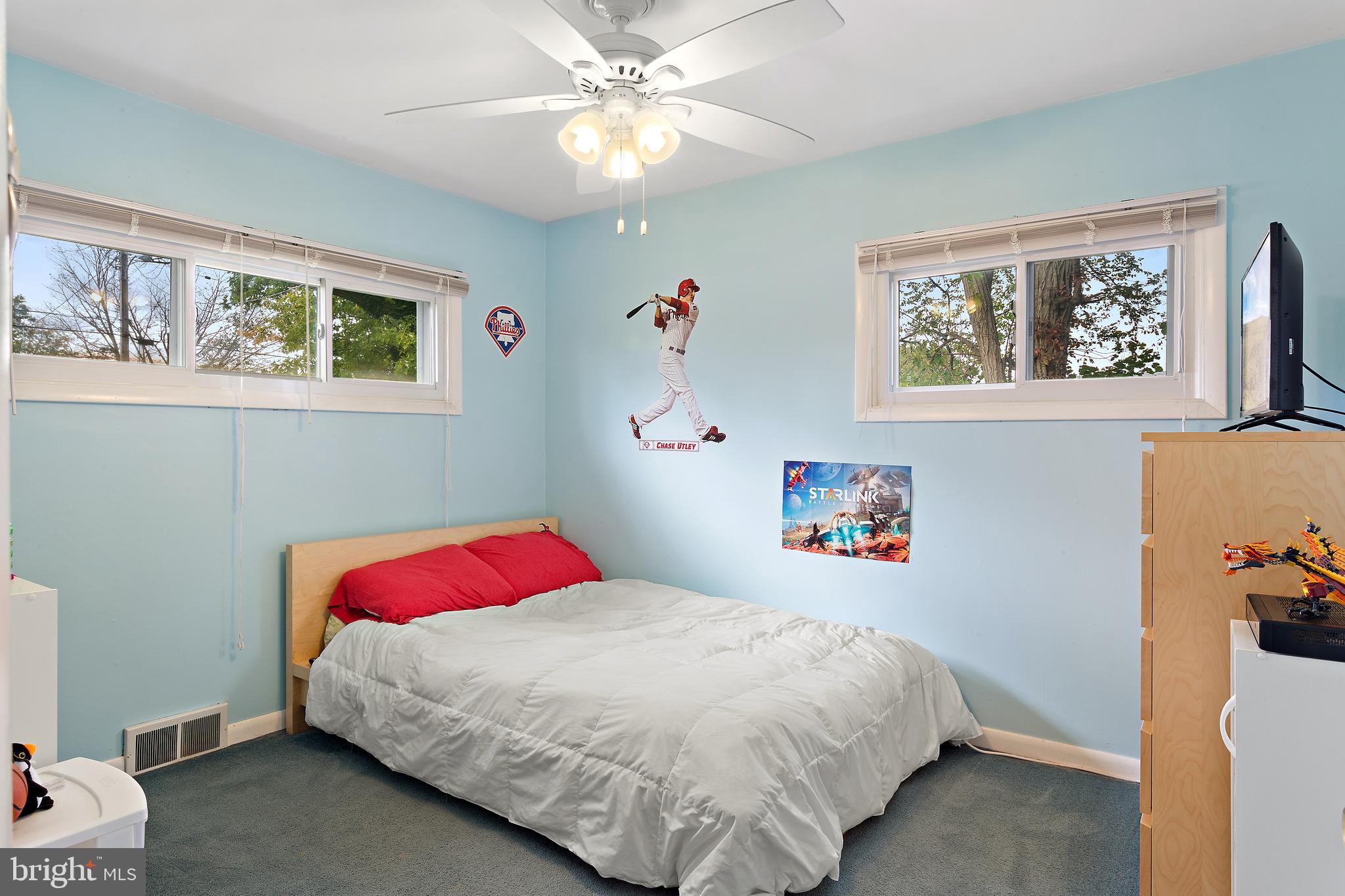 332 Baldwin Road Glassboro, NJ 08028 - Photo 14 of 24 a bedroom with a bed and a painting on the wall