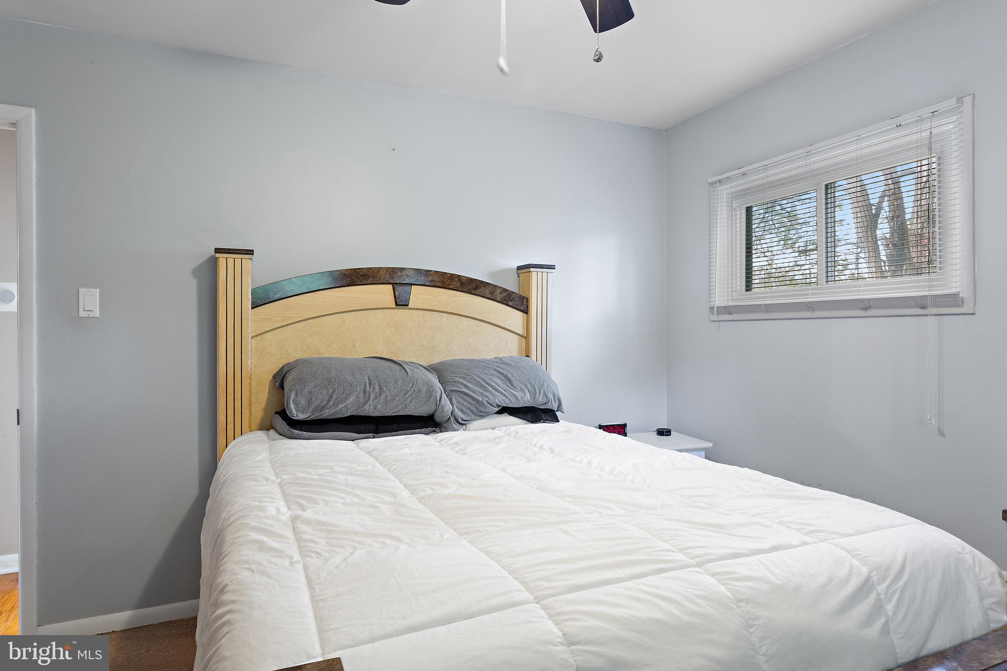 332 Baldwin Road Glassboro, NJ 08028 - Photo 17 of 24 a bedroom with a bed and a window