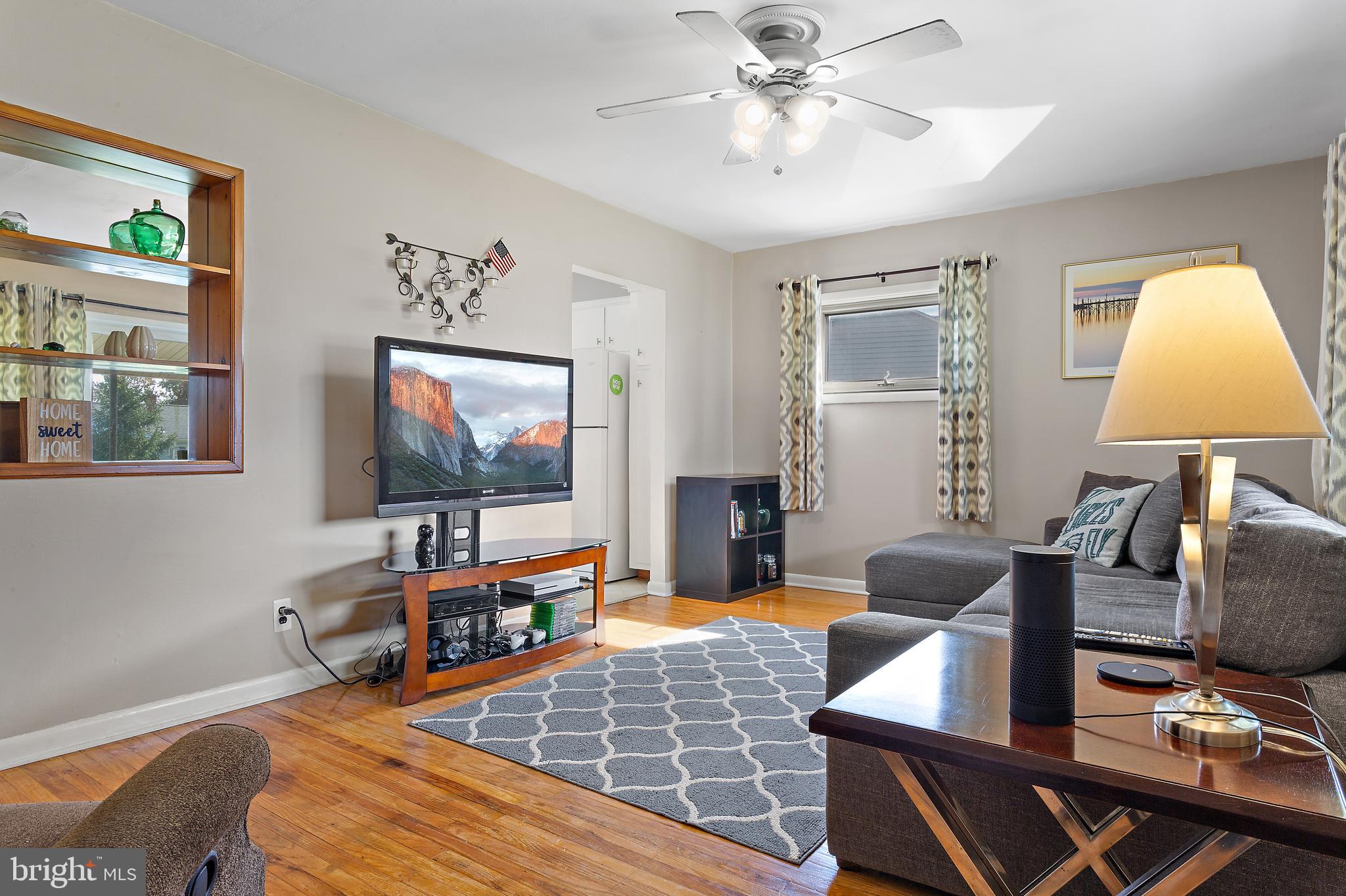 332 Baldwin Road Glassboro, NJ 08028 - Photo 4 of 24 a living room with furniture and a flat screen tv