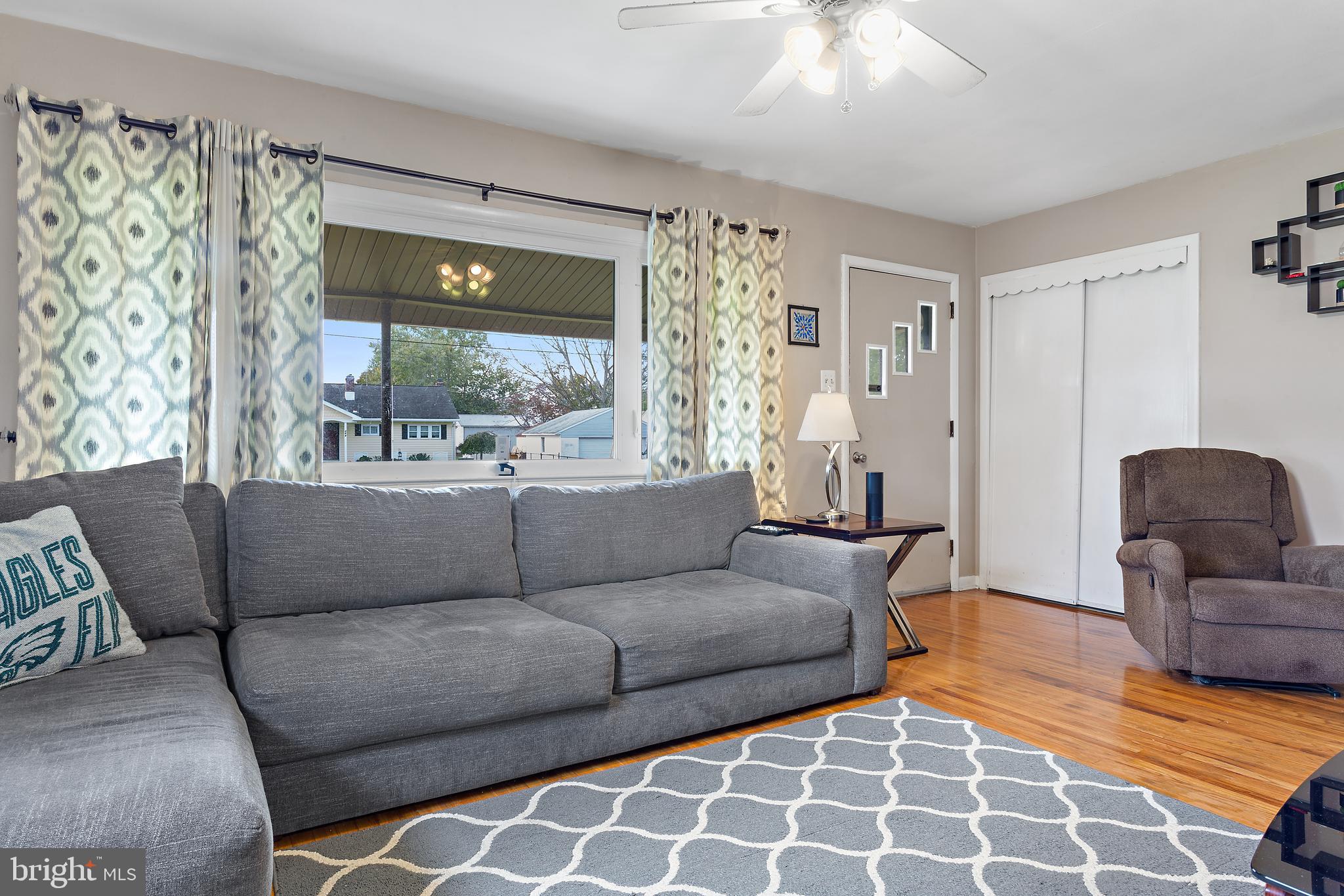 332 Baldwin Road Glassboro, NJ 08028 - Photo 6 of 24 a living room with furniture and a large window