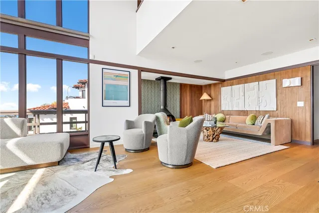 a view of a swimming pool with outdoor seating