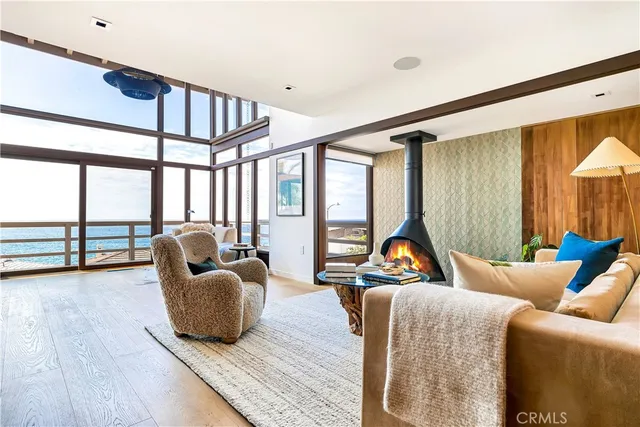 a kitchen with stainless steel appliances a stove a sink dishwasher and a refrigerator