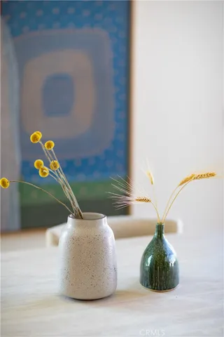 a kitchen with stainless steel appliances kitchen island granite countertop a stove a sink and a refrigerator