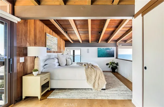a white bath tub sitting next to a white sink