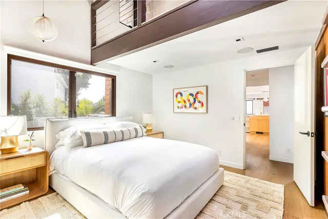 a view of a balcony with chairs