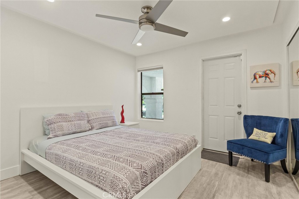 68190 Galardo Road Cathedral City, CA 92234 - Photo 11 of 24 a bedroom with a bed and a chair