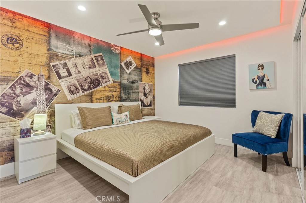 68190 Galardo Road Cathedral City, CA 92234 - Photo 16 of 24 a bedroom with a bed and a couch